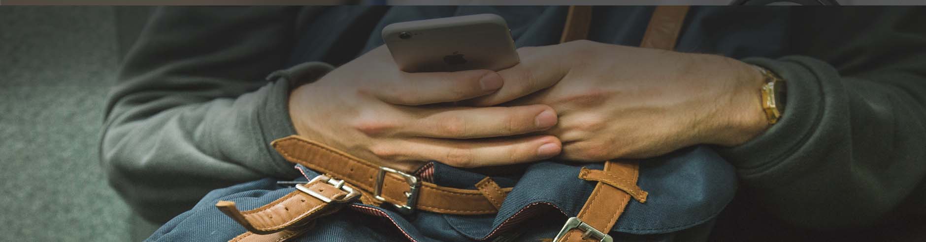hands holding cell phone